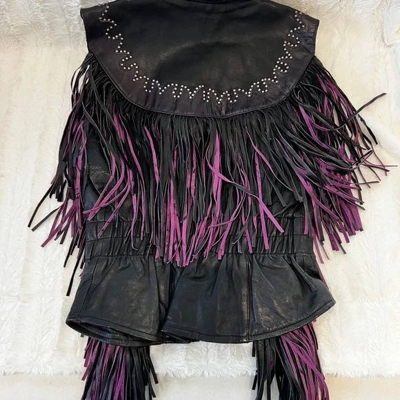 Leather black and purple vest. Fits like a medium although labeled a large. - Picture 2 of 7